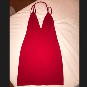 Red fitted dress with criss cross back size Medium